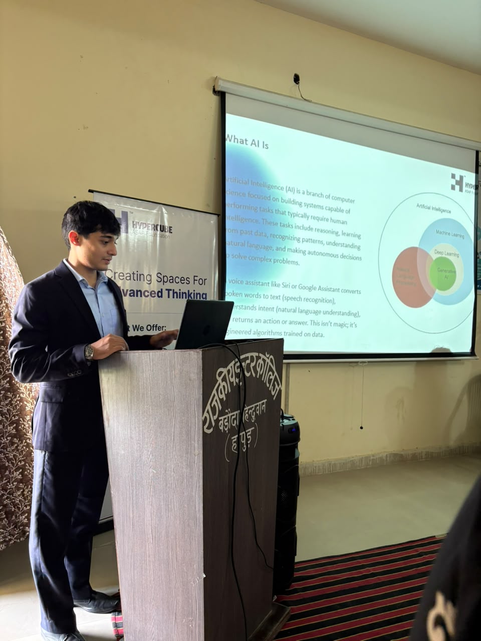 Speaker explaining what Artificial Intelligence is during the AI Pathways session