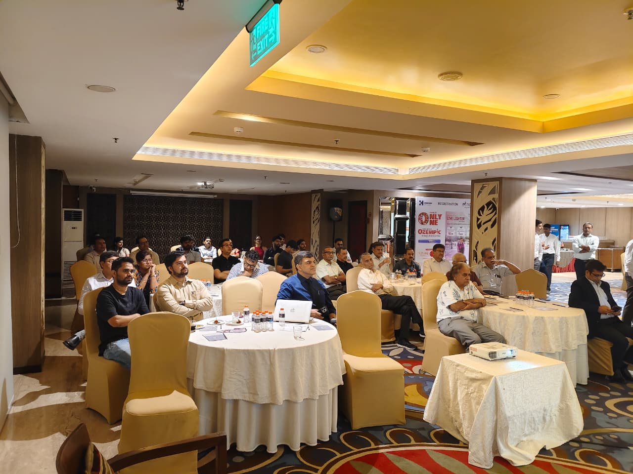 Attendees seated at round tables during Chrome Summit 2026