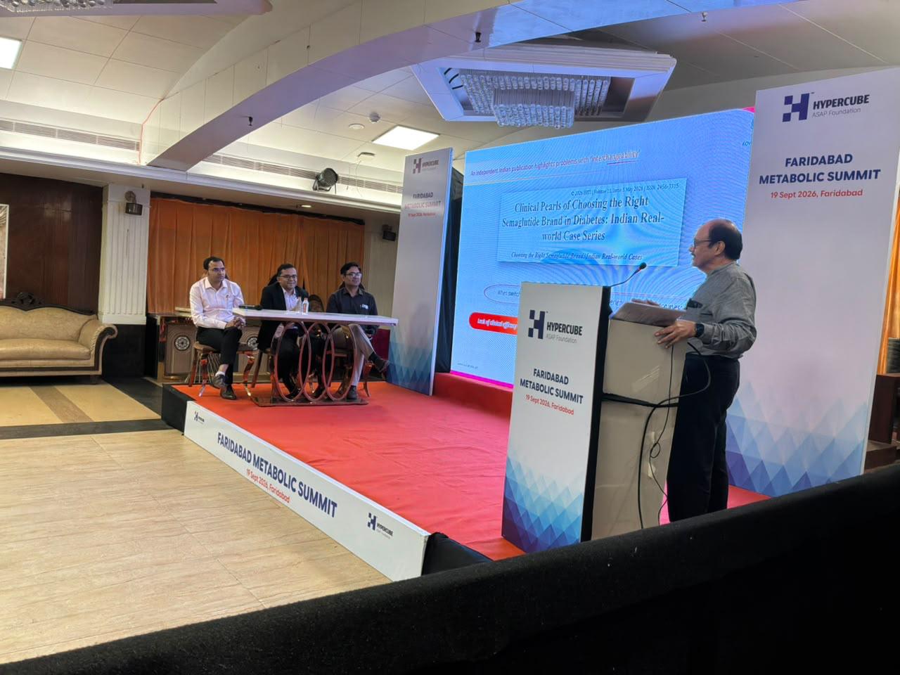 Speaker presenting a clinical session on stage at Metabolic Summit 2026 in Faridabad