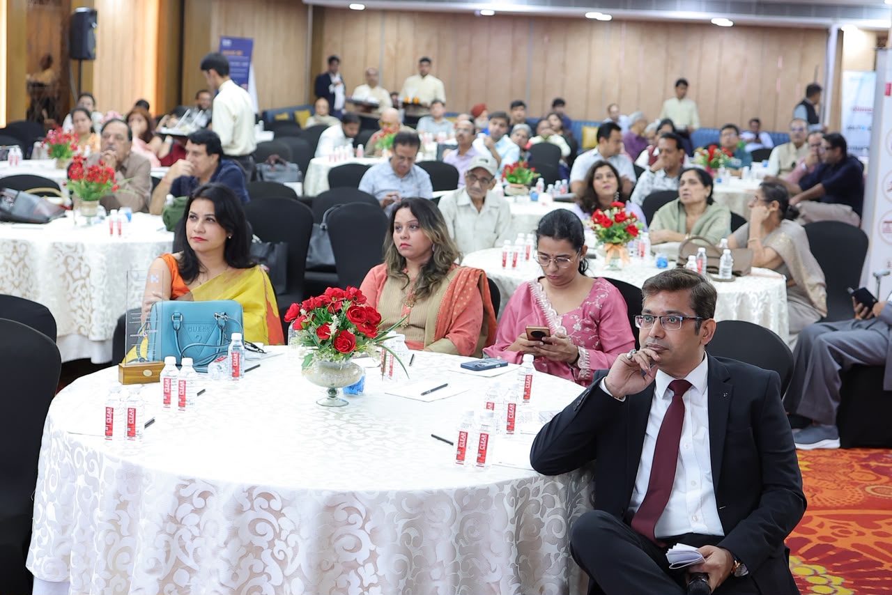 Doctors and guests seated at round tables during the Obesity 4 Dimension CME